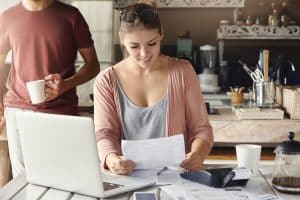 woman happy with Bill Benefits Cuts