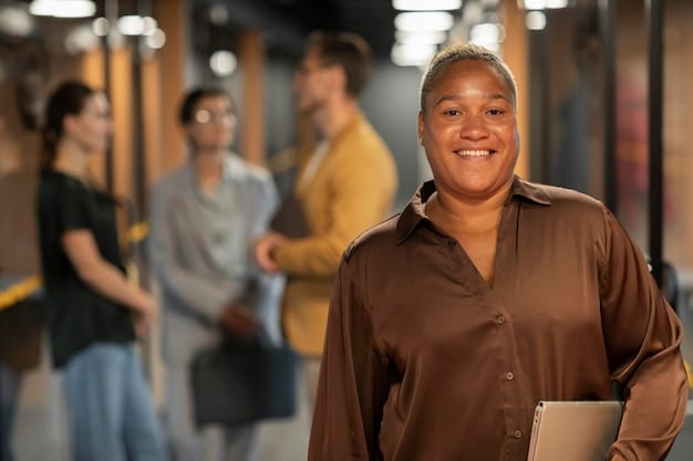 A diverse group of workers smiling, representing the potential beneficiaries of a federal minimum wage increase.