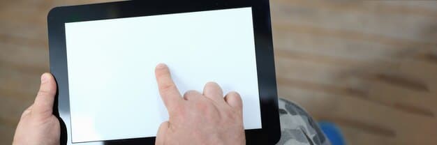 A hand pointing to a form on a tablet screen with the words 
