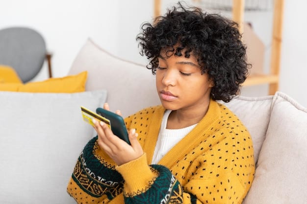 A person looking at their phone with a concerned expression, representing the anxiety and stress associated with receiving debt collection messages electronically.