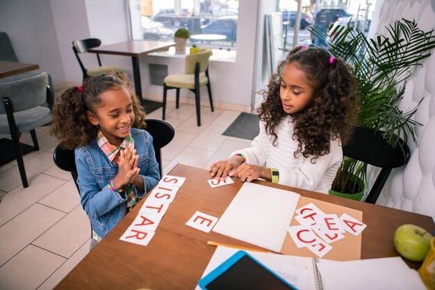 A teacher is working with a young student on phonics using flashcards with letters and pictures. The teacher is pointing to a card, and the student is sounding out the word. The image conveys the structured and focused approach to teaching phonics and its importance in building reading skills. It fits the theme of How to Improve Your Child's Reading Skills: Proven Strategies for Parents by showcasing effective methods for reading instruction.