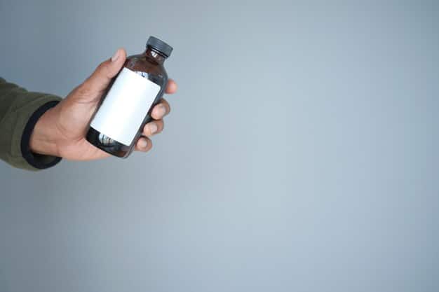 A close-up shot of a prescription bottle with a hand reaching for it. The background is blurred, emphasizing the importance of affordable medications. The image relates to New Legislation Expands Access to Affordable Healthcare: What You Need to Know by highlighting the efforts to lower prescription drug costs.